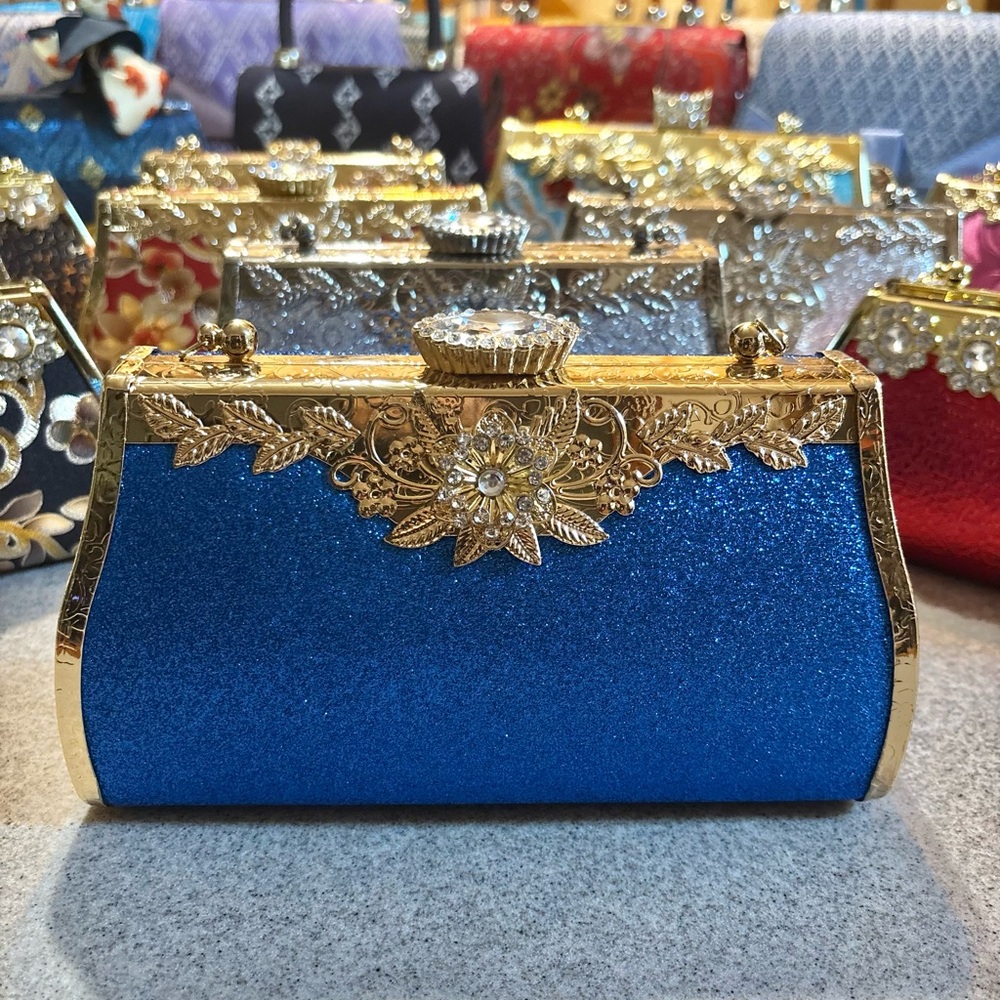 Sparkling Blue Clutch with Gold Detailing with Crossbody chain strap